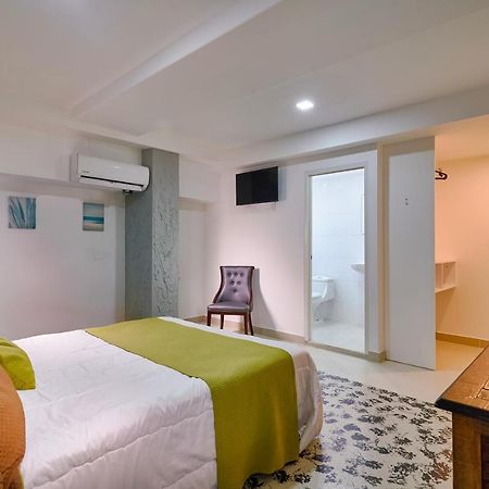Malecon Rooms Y Hotel Санто-Доминго Экстерьер фото